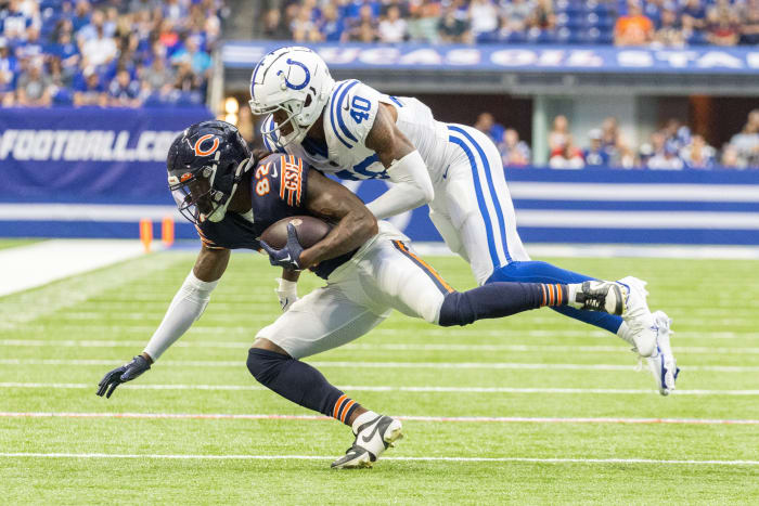 Aug 19, 2023; Indianapolis, Indiana, USA; Chicago Bears wide receiver Daurice Fountain (82) catches the ball while Indianapolis Colts cornerback Jaylon Jones (40) defends in the second quarter at Lucas Oil Stadium. Mandatory Credit: Trevor Ruszkowski-USA TODAY Sports